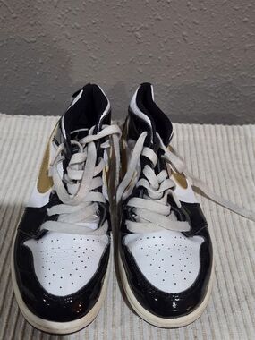 Jordan White, Black & Gold High-Top Sneakers